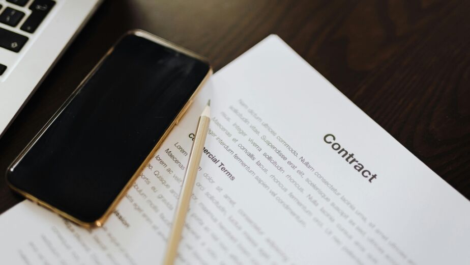 Contract on table for contract to hire employee