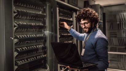Man working on a server for IT contract jobs