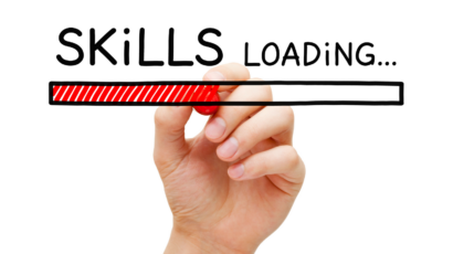 Hand holding marker writing "Skills Loading..." with red loading bar in whiteboard style art